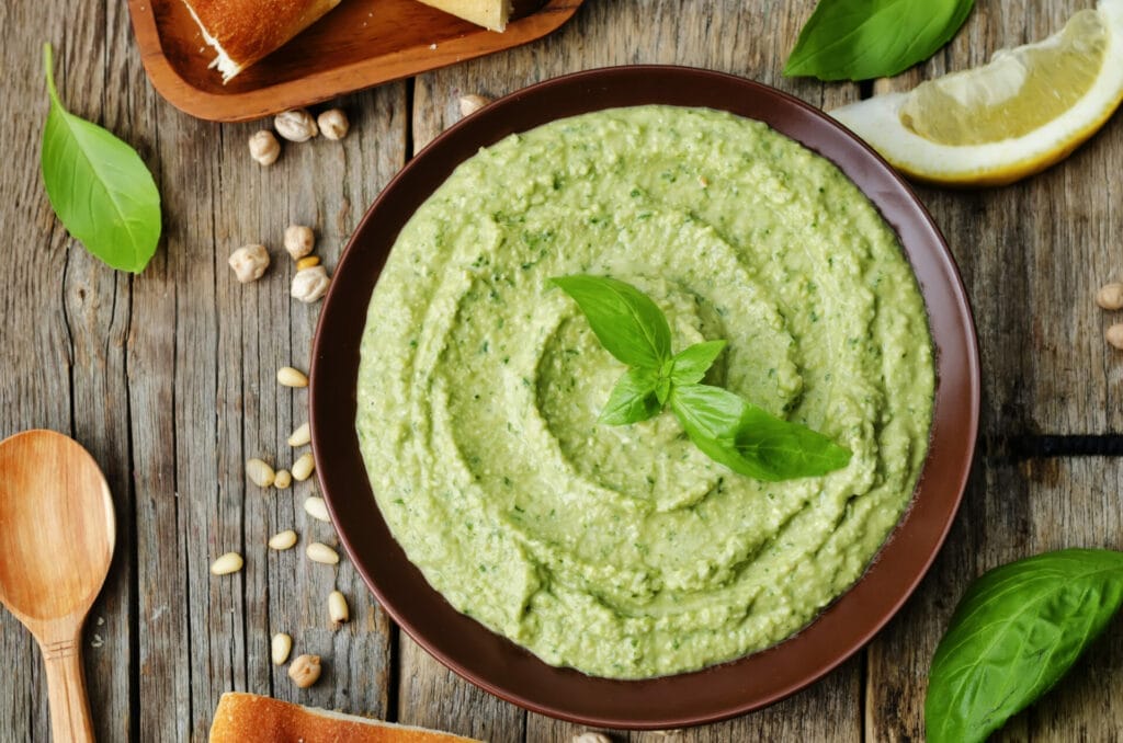 Who turned the hummus green?! Green Edamame Hummus is a fun and festive food for St. Patrick's Day that the whole family can enjoy ☘️ Just make sure that sneaky Leprechaun doesn't it all first!